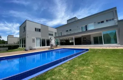 Casa em condomínio fechado com 6 quartos à venda na rodovia haroldo soares glavan, 1760, cacupé, florianópolis, 942 m2 por r$ 13.000.000
