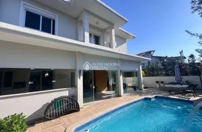 Casa em condomínio fechado com 4 quartos à venda na rodovia doutor antônio luiz moura gonzaga, 3825, rio tavares, florianópolis, 328 m2 por r$ 4.950.000
