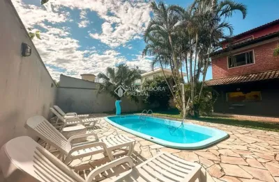 Casa com 4 quartos à venda na rua raymundo carlos lopes, 174, campeche, florianópolis, 135 m2 por r$ 1.890.000