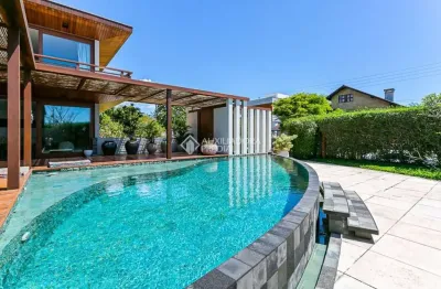 Casa com 3 quartos à venda na rodovia doutor antônio luiz moura gonzaga, 383, rio tavares, florianópolis, 573 m2 por r$ 15.000.000