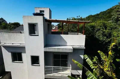 Casa em condomínio fechado com 2 quartos à venda na rua pau de canela, 462, rio tavares, florianópolis, 120 m2 por r$ 750.000