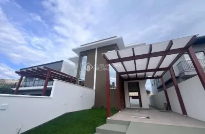 Casa com 3 quartos à venda na rua maria geraldina ramos, 784, carianos, florianópolis, 144 m2 por r$ 1.080.000