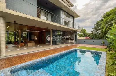 Casa em condomínio fechado com 5 quartos à venda na Avenida Pequeno Príncipe, 1297, Campeche, Florianópolis, 492 m2 por R$ 5.990.000