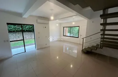 Casa em condomínio fechado com 2 quartos à venda na Rua Laurindo Januário da Silveira, 4303, Lagoa da Conceição, Florianópolis, 141 m2 por R$ 2.300.000