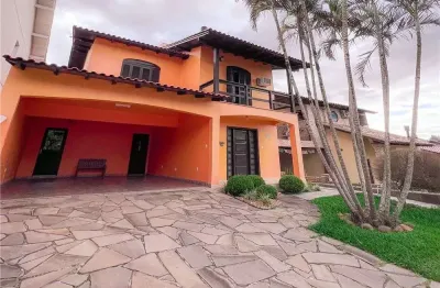 Casa em condomínio fechado com 4 quartos à venda na Rua Tapir Rocha, 1052, São Lucas, Viamão