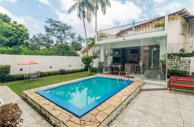 Casa em condomínio fechado com 7 quartos à venda na Rua Estácio de Sá, 332, Chácara das Pedras, Porto Alegre