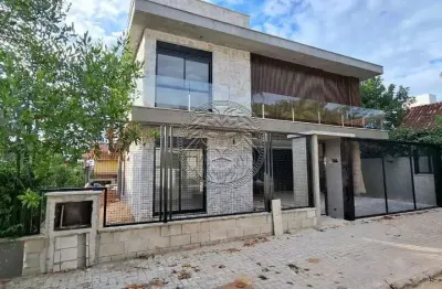 Casa em condomínio fechado com 4 quartos à venda no campeche, florianópolis  por r$ 4.300.000