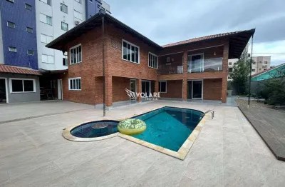 Casa com 4 dormitórios 3 suítes piscina 500m² área útil 2 vagas r$ 1.950.000,00