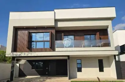 Casa assobradada à venda no alphaville nova esplanada 3– 4 suítes, piscina, área gourmet e estuda permuta