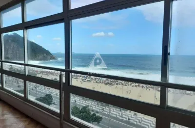 Apartamento localizado no leme, com quatro suítes, duas vagas de garagem