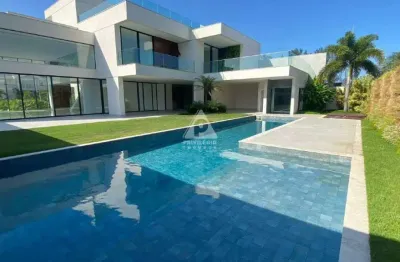 Maravilhosa casa contemporânea à venda no condomínio malibu, na barra da tijuca, com terreno de 1050 m² e 1100 m² de área construída. design bybitton