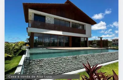 Casa a venda 6 suítes alto padrão no piscinas naturais em praia do forte - bahia
