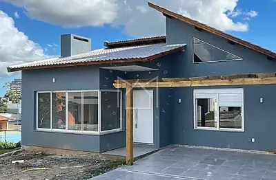 Casa em condomínio fechado com 2 quartos à venda na rua antônio ramos, 440, villa lucchesi, gravataí, 160 m2 por r$ 750.000