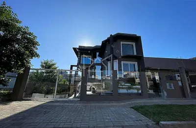 Casa em condomínio fechado com 4 quartos à venda na rua do butiá, 27, reserva do arvoredo, gravataí, 215 m2 por r$ 999.000