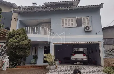 Casa com 5 quartos à venda na rua vinte de setembro, barnabé, gravataí, 258 m2 por r$ 1.300.000