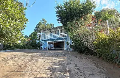 Casa com 4 quartos à venda no Tarumã, Viamão 