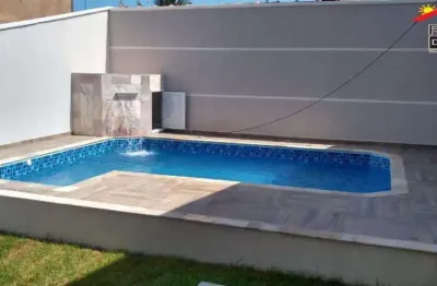 Casa com pisciana e 3 dormitórios em itanhaém - frente mar