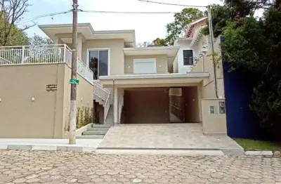 Casa de alto padrão de frente para o lago do condomínio reserva