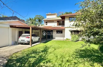 Casa com 4 quartos à venda na rua canto da amizade, 246, lagoa da conceição, florianópolis, 228 m2 por r$ 2.500.000