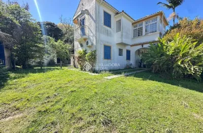 Casa com 4 quartos à venda na rua joão pacheco da costa, 411, lagoa da conceição, florianópolis, 450 m2 por r$ 2.850.000