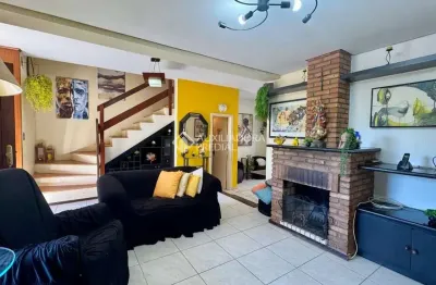 Casa em condomínio fechado com 3 quartos à venda na avenida da cavalhada, 6021, cavalhada, porto alegre, 135 m2 por r$ 650.000