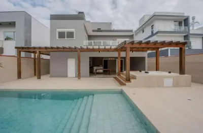 Casa em condomínio fechado com 4 quartos à venda na avenida das arapongas, 1265, ariribá, balneário camboriú por r$ 6.900.000