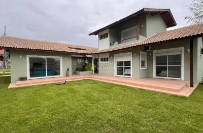 Belíssima casa a venda em condomínio na cachoeira do bom jesus