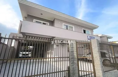Belíssimo sobrado residencial com sala comercial localizado no bairro saguaçu.