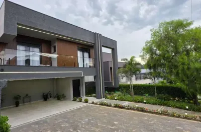 Casa com 4 dormitórios à venda, 435 m² por r$ 4.500.000,00 - condomínio reserva santa maria - jandira/sp