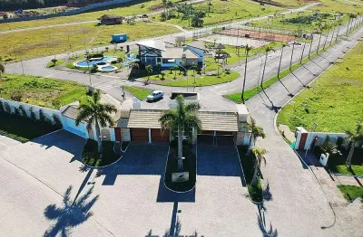 Terreno em condomínio fechado à venda na rua joaquim garcia, rio do meio, camboriú por r$ 762.280