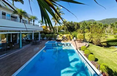 Casa a venda em Caraguatatuba - 8 suítes, 4 vagas - Área Gourmet - Condomínio Costa Verde Tabatinga