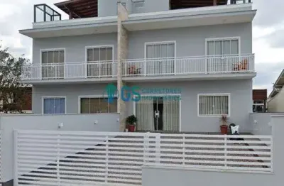 Excelente sobrado com 03 dormitórios sendo 01 suíte, com ampla área gourmet com vista permanente para praia da pinheira  em palhoça/sc