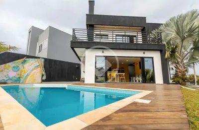 Casa em condomínio - 249m²  de área privativa - 5 dormitórios ( sendo 1 suíte ) - piscina - 8 vagas codigo: 128884