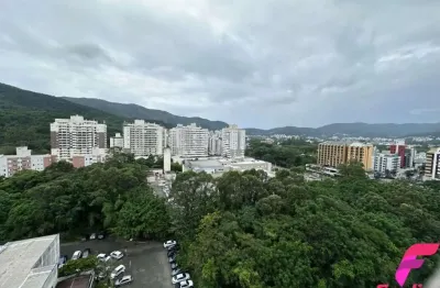Apartamento 2 dormitórios sendo 1 suíte e 2 vagas de garagem em andar alto e com vista livre no itacurubi florianópolis sc