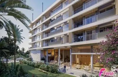 Apartamento para venda em florianópolis em jurerê, 2 dormitórios, 2 suítes, 3 banheiros, 2 vagas, hobby box, frente mar