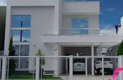 Casa estilo contemporâneo à venda com 4 dormitórios no carianos