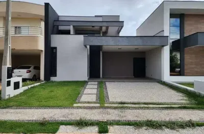 Casa térrea à venda com 3 suites, 4 vagas e 5 banheiros.