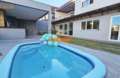 Casa à venda em novo hamburgo, rio branco - piscina, churrasqueira, closet, semi mobiliado!