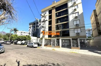Apartamento com 2 dormitórios, sendo uma suíte, sacada com churrasqueira, de frente, garagem coberta, à venda em novo hamburgo.