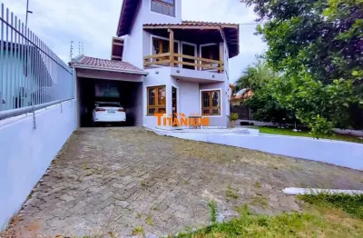 Casa com 4 dormitórios, sendo uma suíte com banheira de hidromassagem à venda em novo hamburgo.