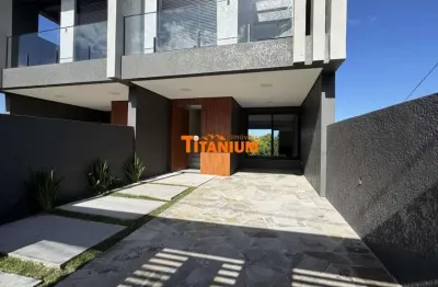 Casa à venda com 3 dormitórios, sendo 1 suíte, lareira, churrasqueira, no bairro rincão em novo hamburgo.