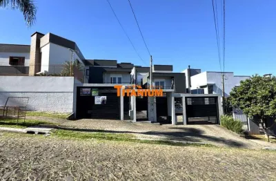 Casa com 3 dormitórios, sendo duas suítes uma com closet, todos dormitórios com sacada, pátio, ótima localização à venda em novo hamburgo, ideal.