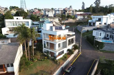 Casa em condomínio 4 quartos, 342m² à venda em novo hamburgo.