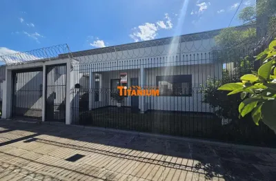 Casa plana semimobiliada, com 3 dormitórios, pátio nos fundos, poço artesiano, placa solar, garagem coberta no Bairro Ouro Branco em Novo Hamburgo