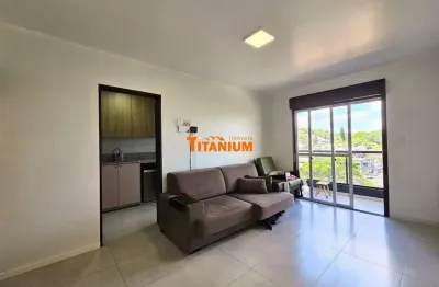 Apartamento à venda com 2 dormitórios, 2 banheiros, dependência de empregada, sacada aberta, no Bairro Pátria Nova em Novo Hamburgo.