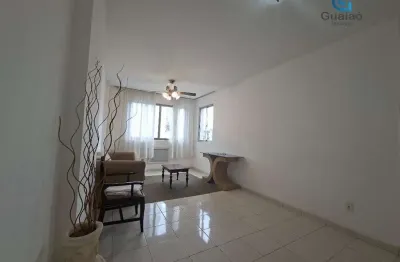 Alugo amplo apartamento mobiliado de 2 dormitórios e garagem no gonzaga em santos