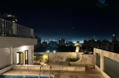 Vendo ampla cobertura, 04 dormitórios e 2 vagas, na ponta da praia em santos.