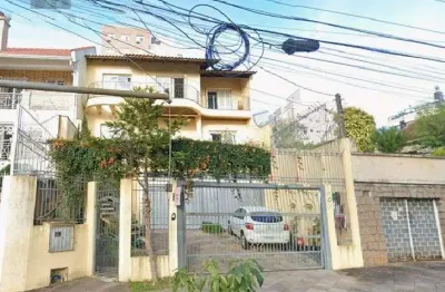 Casa residencial à venda no bairro Jardim Botânico com 380 m² e 5 dormitórios/quartos.