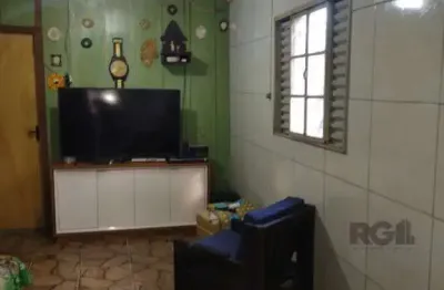 Casa residencial à venda no bairro Camaquã com 70 m² e 3 dormitórios/quartos.