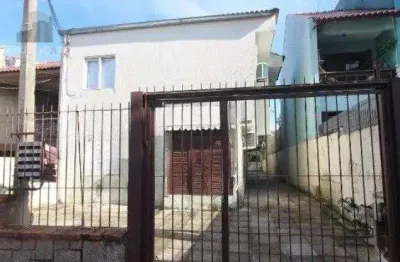 Casa de condomínio à venda no bairro Partenon com 80 m² e 3 dormitórios/quartos.